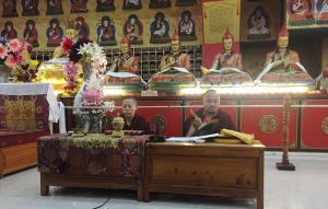 Umdze Venerable Sonam la and Anila Tsultrim Dechen lead a session of group practice in the Great Stupa