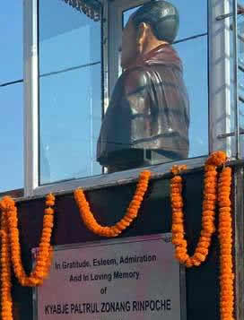 Unveiling a statue at Dondrub Ling